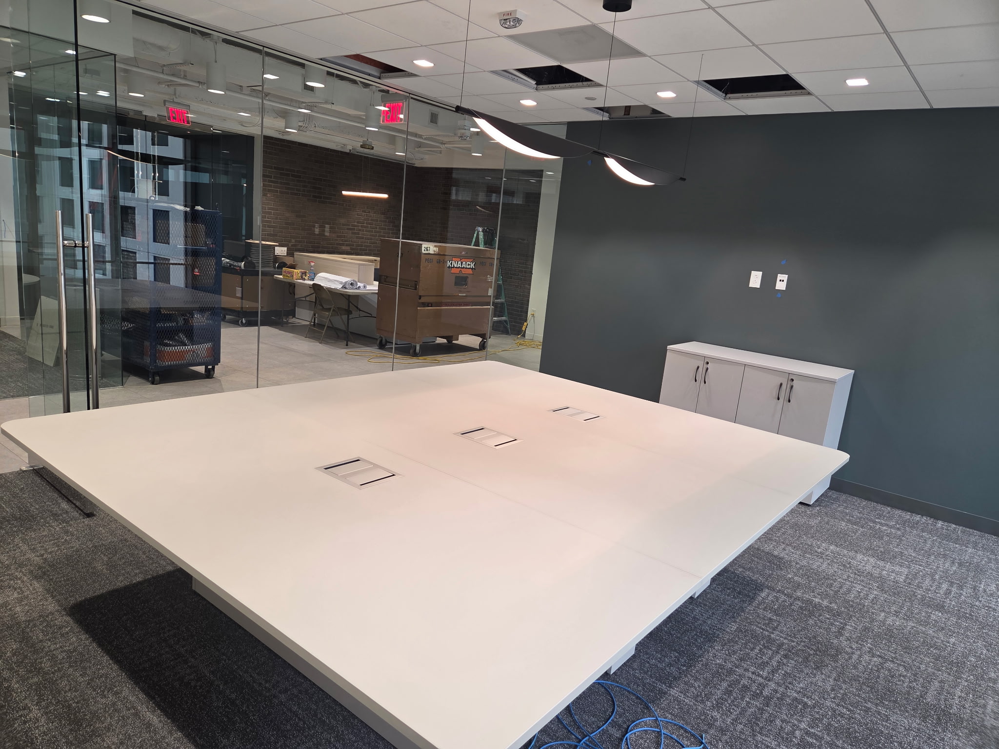 White conference table with integrated power modules